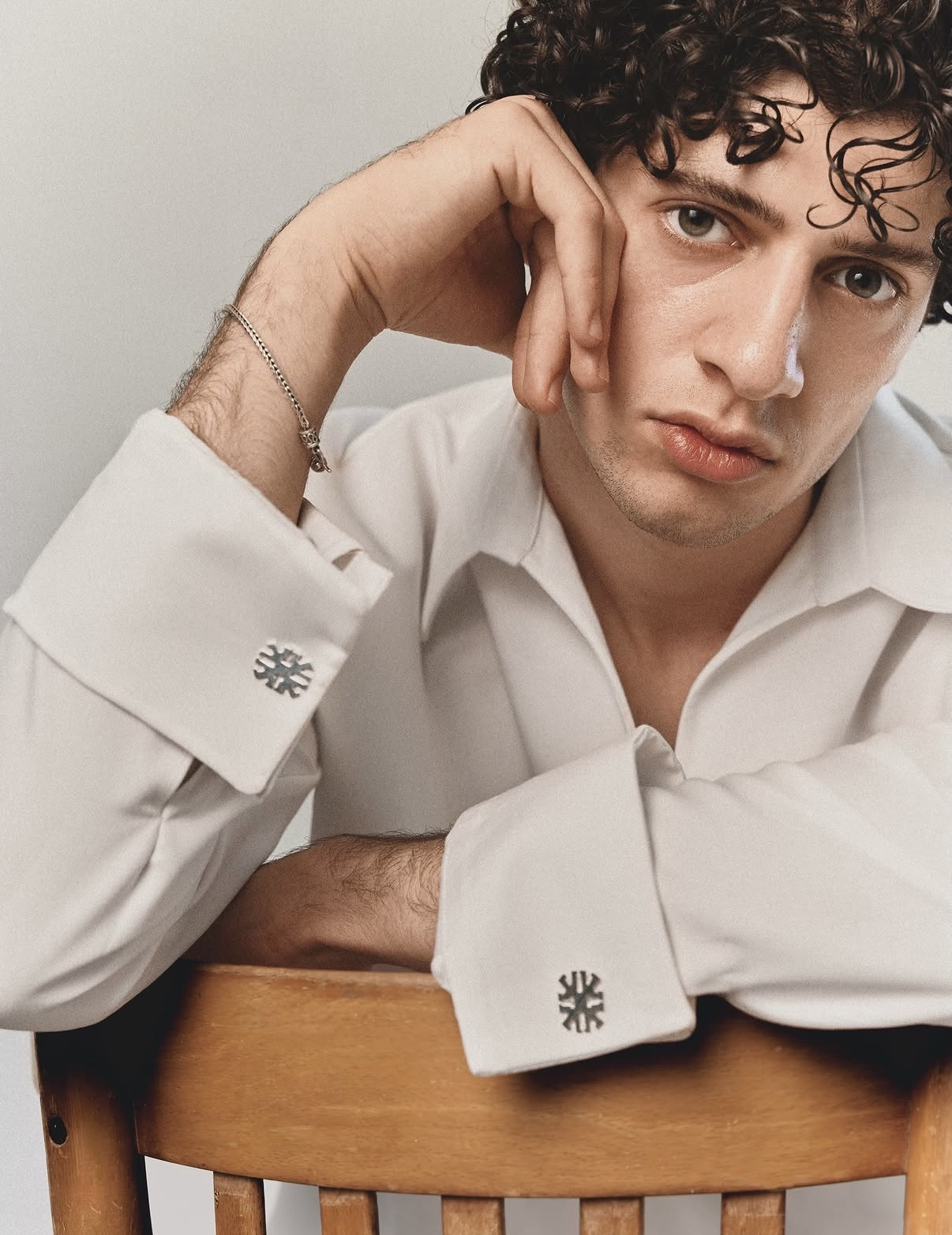 SUEZN silver cuff accessory on a white shirt